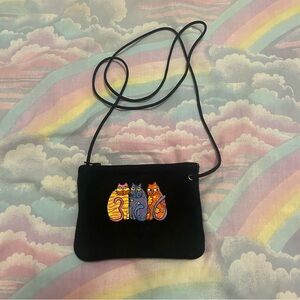 Embroidered cat mini bag